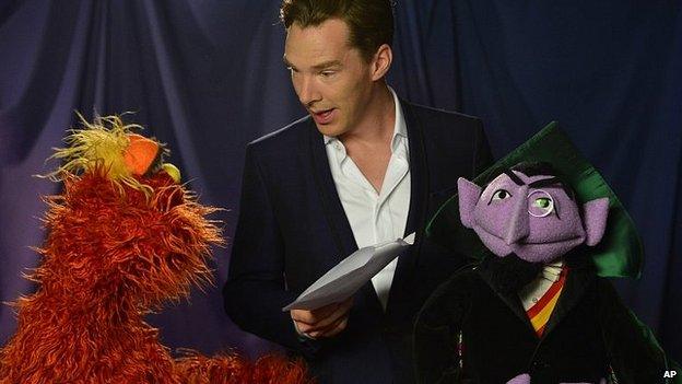 Benedict Cumberbatch with Muppets Murray and Count von Count