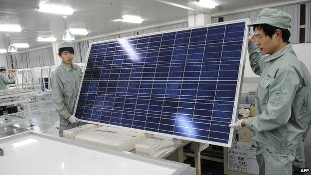 Solar panel being constructed at a factory in China