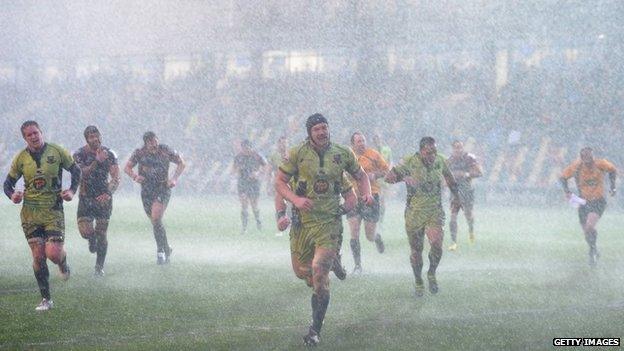 Newport Gwent Dragons and Northampton Saints abandon the pitch during their rugby match on 25 January, 2014 in Newport, Wales