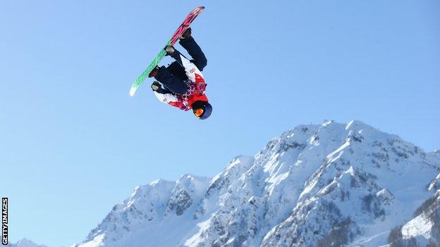 Billy Morgan performing a trick on his snowboard