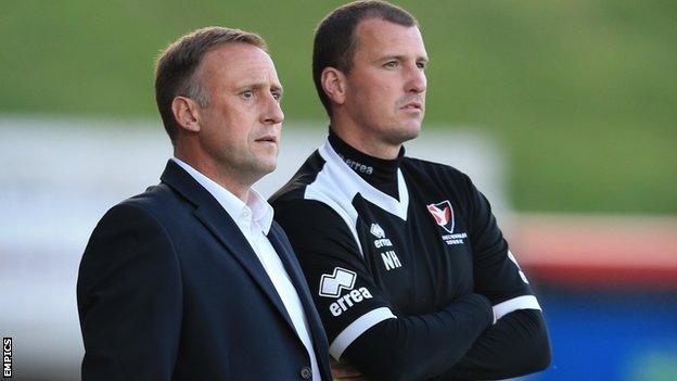 Cheltenham Town manager Mark Yates and assistant Neil Howarth