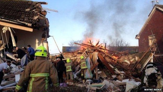 Rescue workers at the scene of the explosion