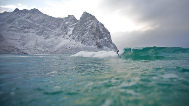 Surfer in a still from film North of the Sun