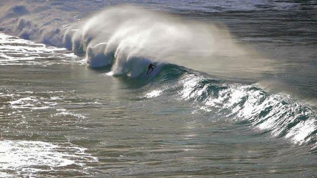 Surfer in a still from film North of the Sun