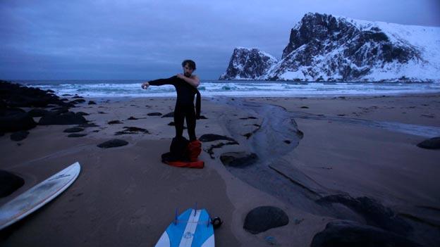 Surfer in a still from film North of the Sun