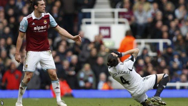 West Ham's Andy Carroll (left) and Swansea's Chico Flores