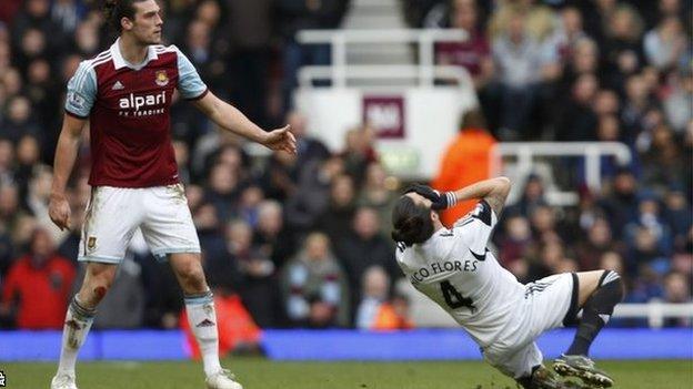 West Ham's Andy Carroll (left) and Swansea's Chico Flores