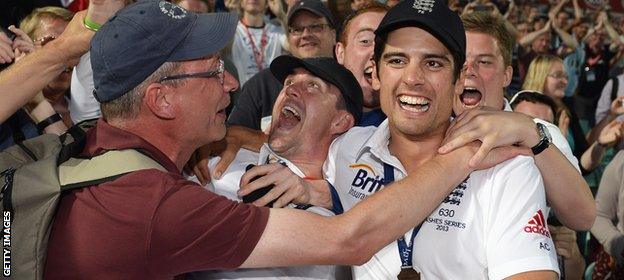 Kevin Pietersen and Alastair Cook celebrate victory in the 2013 Ashes series in England