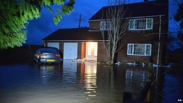 Flooded property in the village of Moorland, Somerset.