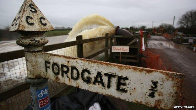 Flood water is seen pumped into the river at the pumping station near Fordgate on the Somerset Levels.