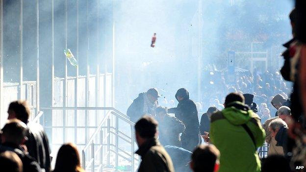 Protesters storm a local government building in the northern Bosnian town of Tuzla on February 7, 2014