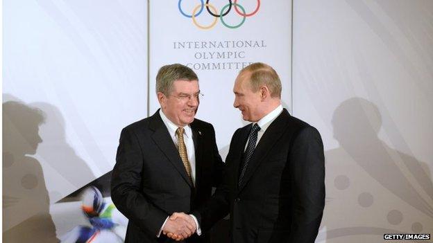 IOC president Thomas Bach (left) welcomes Russia's president Vladimir Putin (Right) to a Gala dinner in Sochi on 6 February