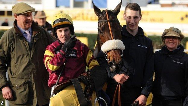 Jockey Jason Maguire (second left) poses with winning connections and trainer Kim Bailey (left) after winning the Denman Chase with Harry Topper (centre)