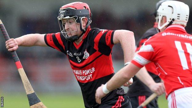 Mount Leinster's Derek Byrne in action against Declan Laverty of Loughgiel