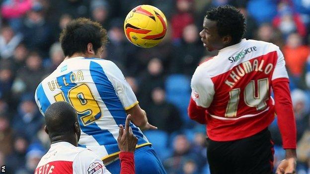 Brighton's Leonardo Ulloa heads in his side's winner against Doncaster