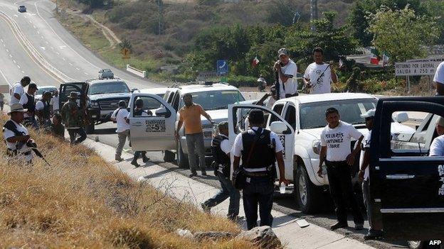 Vigilantes outside Apatzingan