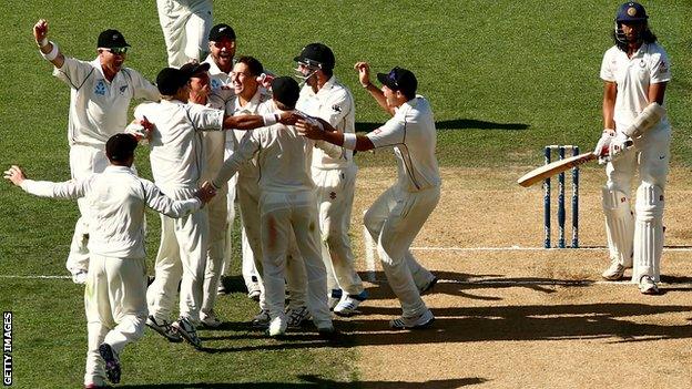 New Zealand celebrate after Trent Boult dismisses India's Ishant Sharma to claim the First Test at Eden Park.