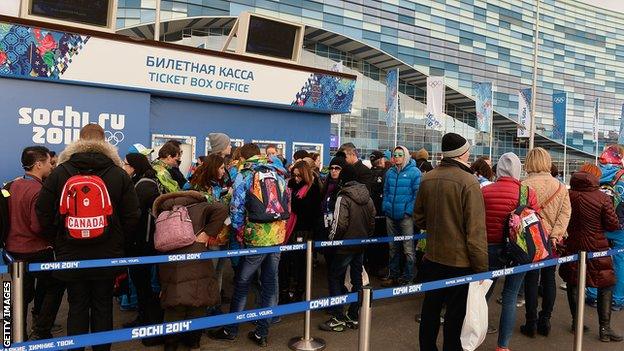 Spectators queue outside the Iceberg Skating Palace inside the Olympic Park at Sochi 2014