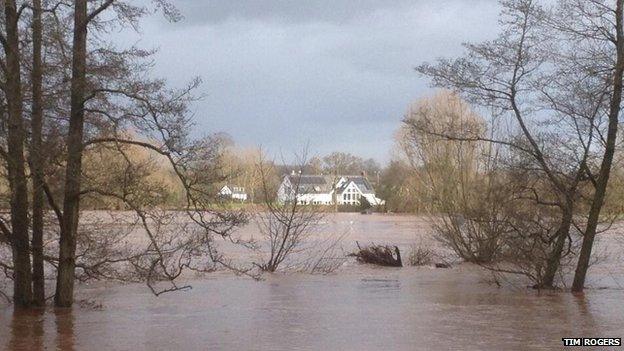 House at Llanfair Gobion surrounded by water