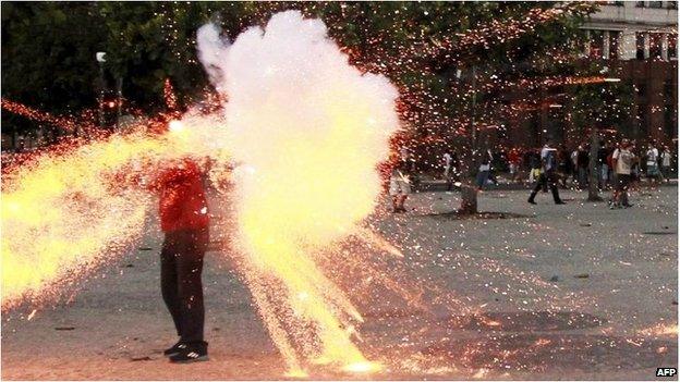 Cameraman hit by explosive in Rio de Janeiro