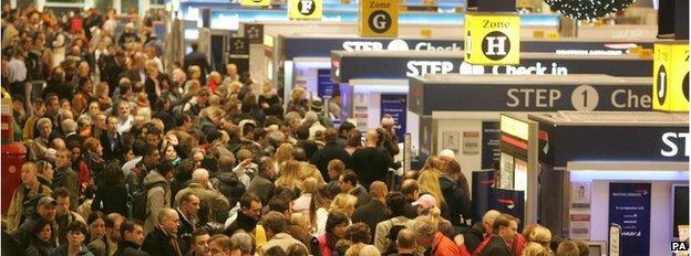 Crowds queuing at an airport