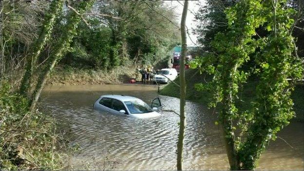 A car stuck in floodwater in Kent