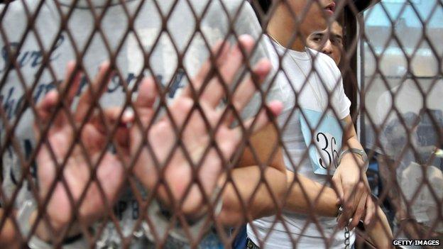 Suspected members of the Mexican drug cartel Los Zetas from Guatemala and Mexico wait in court for a judgement in Guatemala City on 27 June, 2012.