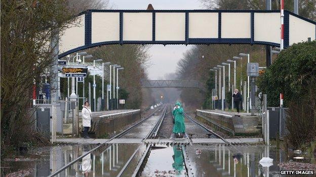 Flooded railway lines after the river Thames burst it's banks in Datchet, England