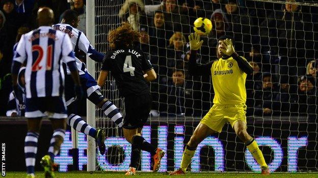 West Brom striker Victor Anichebe scores against Chelsea