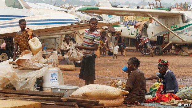 Displaced people at a camp at Bangui airport on 11 February 2014