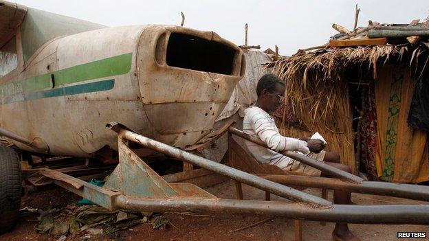 Displaced person at a camp at Bangui airport on 11 February 2014