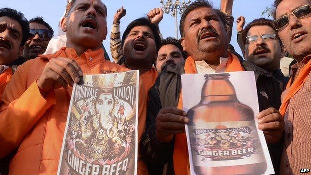 Activists of India's Shiv Sena party shout slogans as they protest against the Australian-based company Brookvale Union, manufacturer of an alcoholic ginger beer, during a demonstration in Amritsar on November 13, 2013.