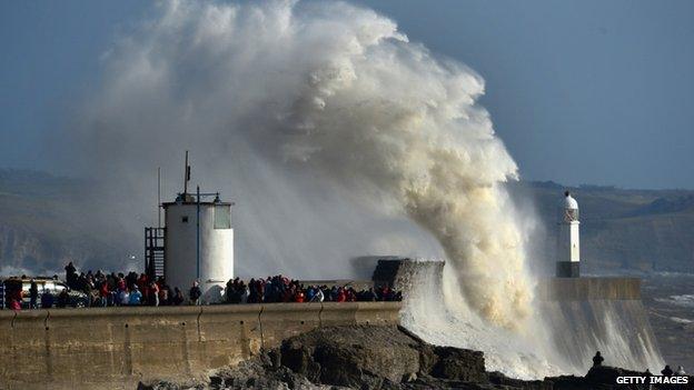 Waves break over Porthcawl harbour, south Wales