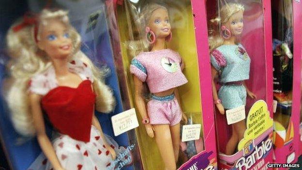 Barbie dolls on a shelf in London.