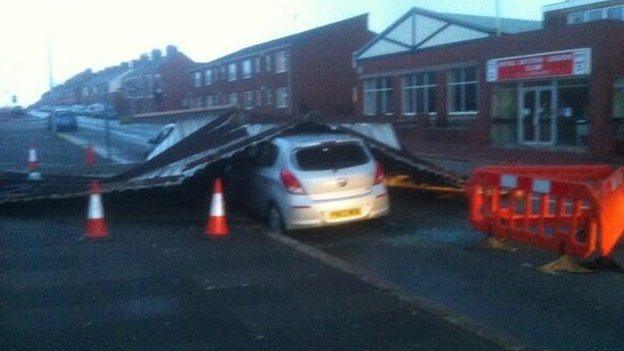 Two cars were under this metal sheeting at Barrow's Holker Street