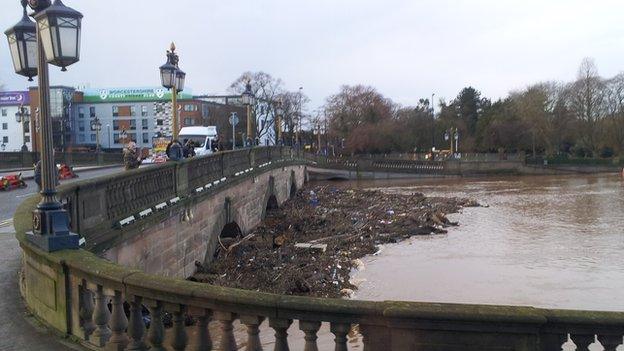 Flood debris trapped under the bridge