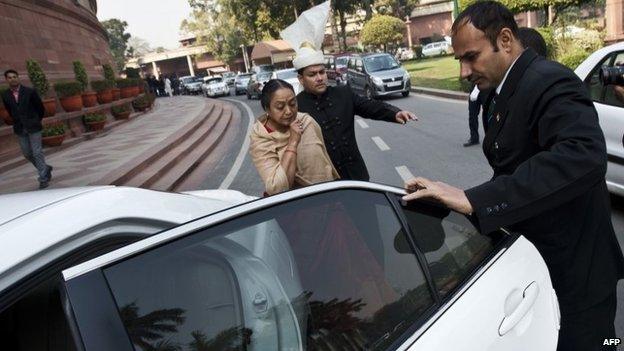 Indian Speaker of Lower House of Parliament (Lok Sabha) Meira Kumar (C) leaves Parliament after protests inside the parliament building in New Delhi on February 13, 2014