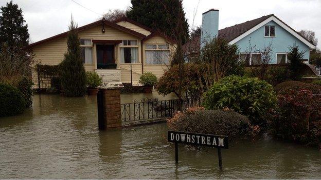 Houses along the flooded Towpath in Shepperton