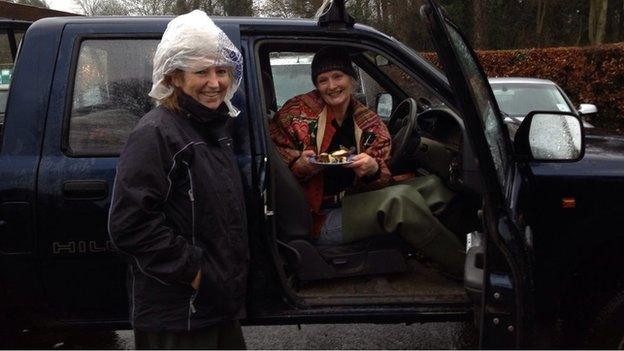 Vivienne Leighton (left) and Sally Pemberton do rounds in Sally's 4x4 along the flooded Towpath