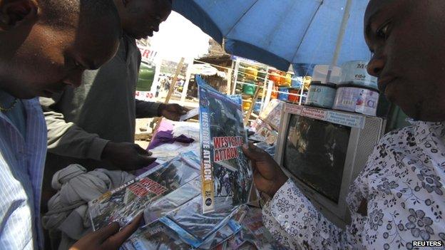 People browse DVDs for sale in Nairobi, Kenya - 2014