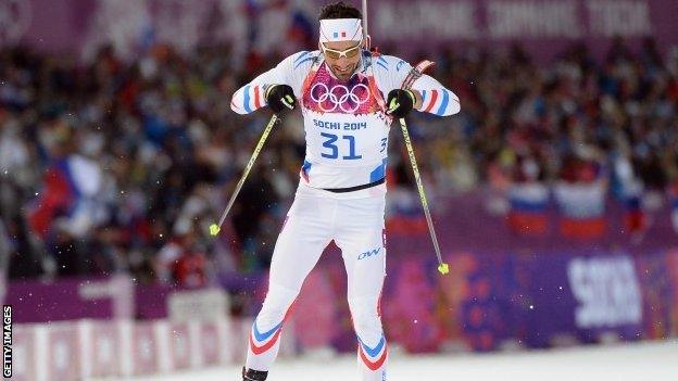 Martin Fourcade of France approaches the finish line in the men's individual 20 km