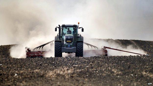 Tractor ploughing near Barlad, Romania - file pic