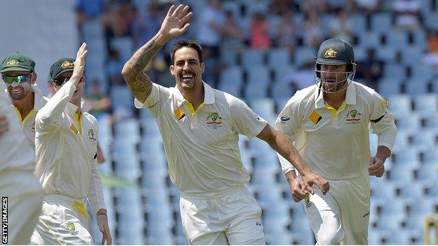 Australia bowler Mitchell Johnson celebrates taking a wicket against South Africa