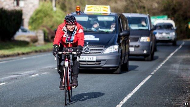 Davina McCall cycles