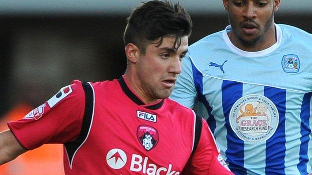 New Coventry City loan signing Michael Petrasso (l) plays against the Sky Blues, on loan from Oldham Athletic, earlier this season.