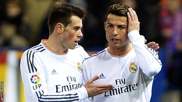 Real Madrid player Cristiano Ronaldo with team-mate Gareth Bale during the Copa del Rey tie with Atletico Madrid