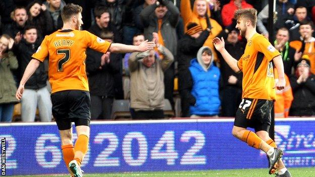 Wolves' Michael Jacobs (right) celebrates with James Henry