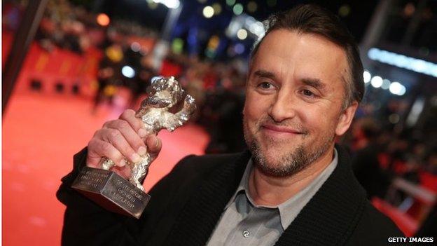 Director Richard Linklater poses with his Silver Bear for Best Director