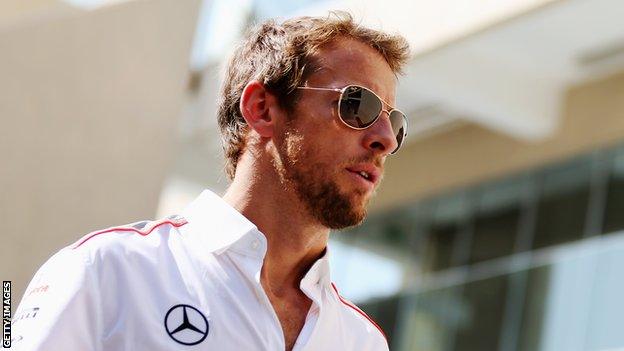 ABU DHABI, UNITED ARAB EMIRATES - NOVEMBER 03: Jenson Button of Great Britain and McLaren attends the drivers parade before the Abu Dhabi Formula One Grand Prix at the Yas Marina Circuit on November.