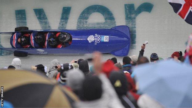 The Britain-1 four-man bobsleigh team piloted by John Jackson during heat 1 at the Whistler sliding centre during the Vancouver Winter Olympics on February 26, 2010.